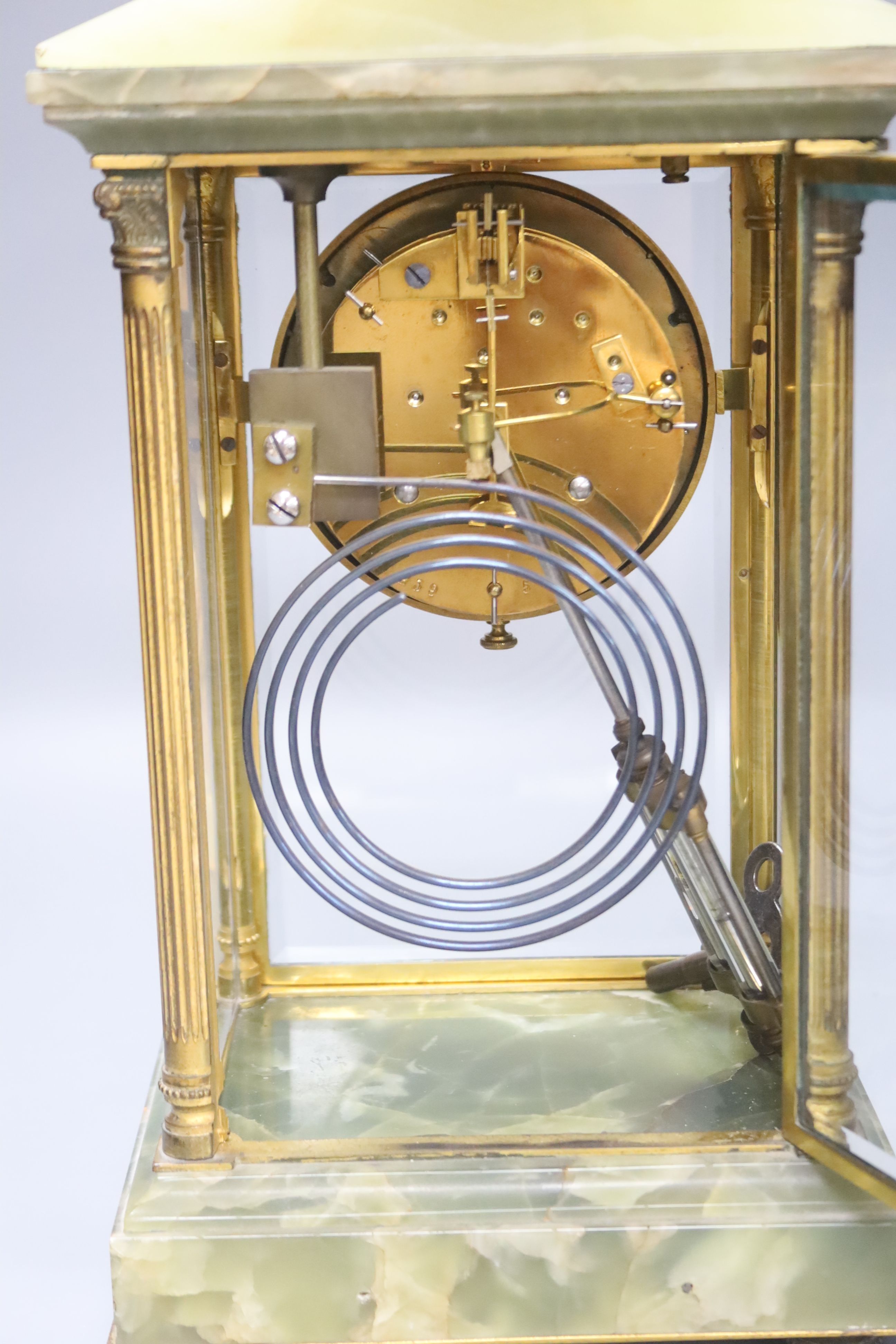 A French green onyx and gilt brass four glass mantel clock, height 32cm